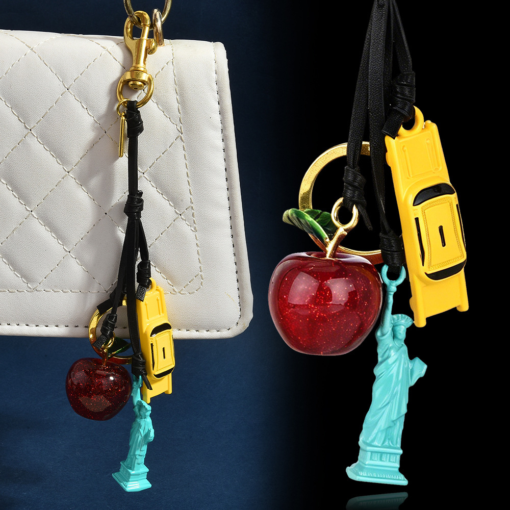 Breloque de sac en cuir à thèm - Travel Accessories New York avis et prix